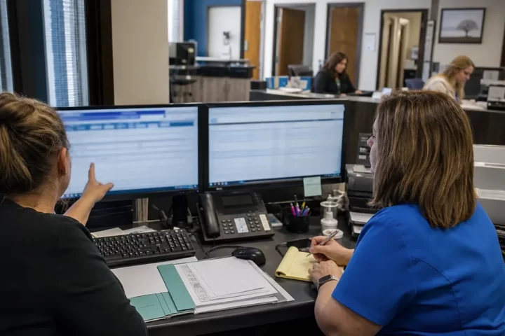 Urgent care leadership reviewing billing performance