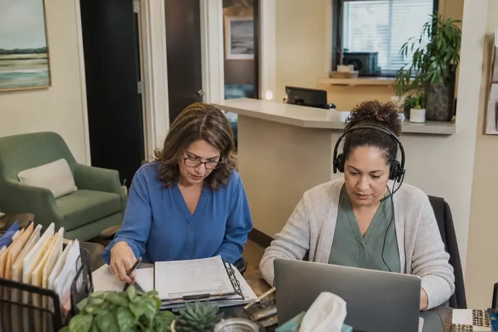 Ambulatory surgery center administrators comparing billing services