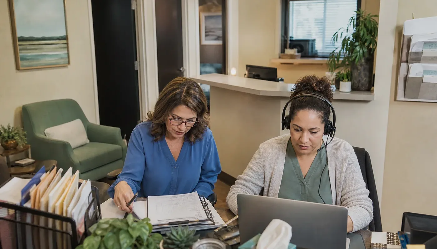 Ambulatory surgery center administrators comparing billing services