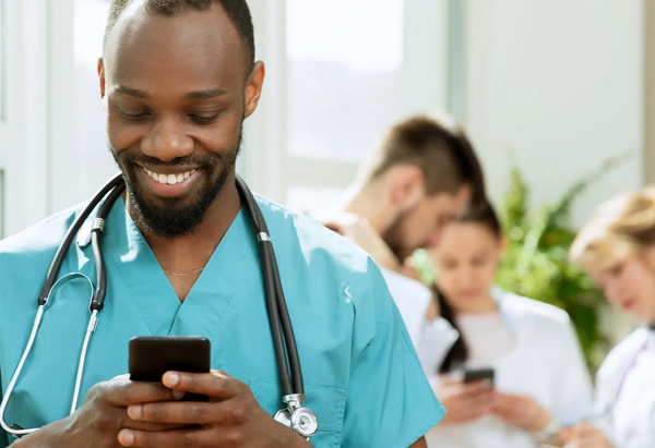Medical office team reviewing billing software